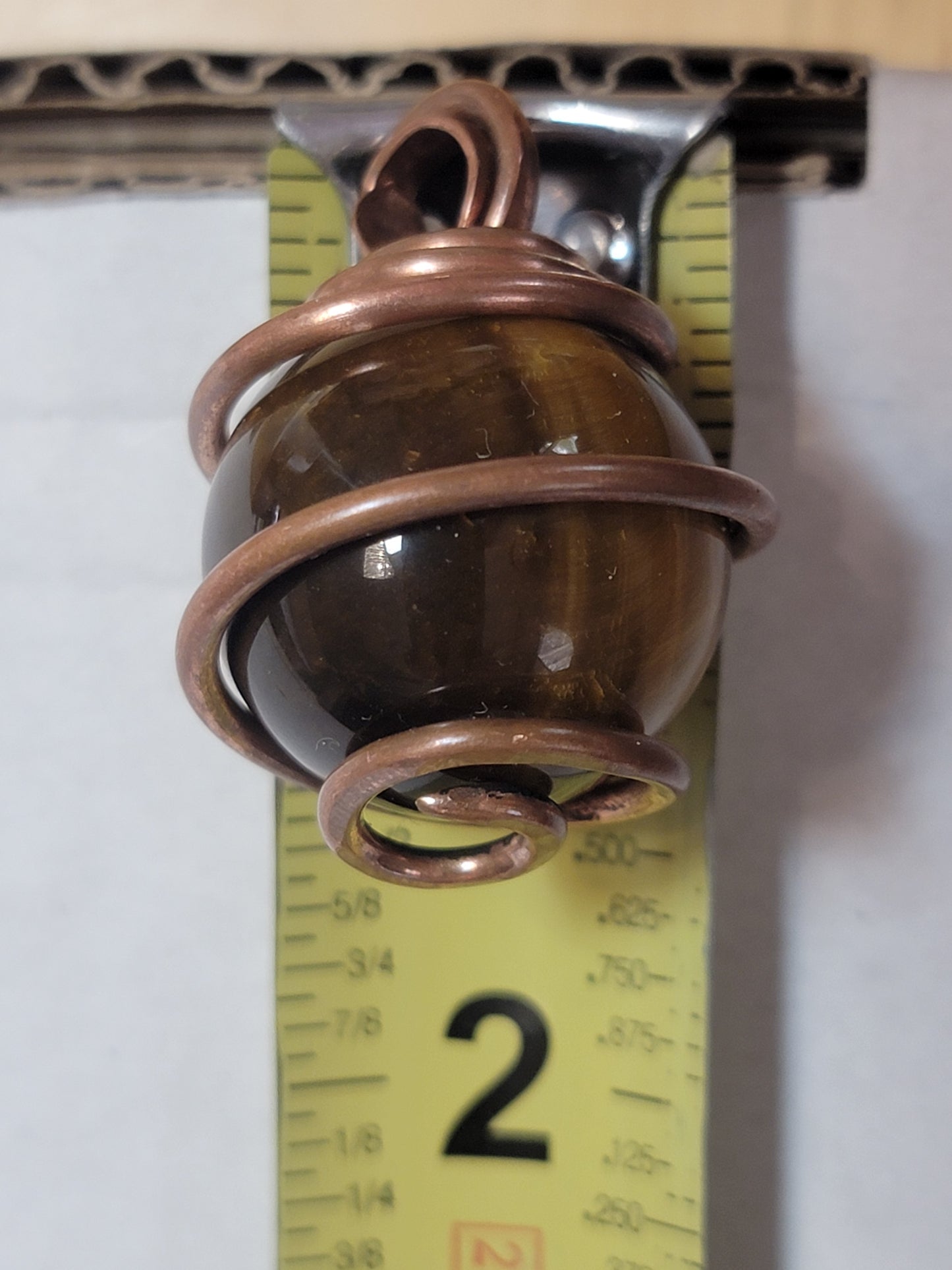 Tigers eye wrapped in Copper